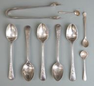 Four hallmarked silver coffee spoons, three hallmarked silver salt or mustard spoons, a pair of