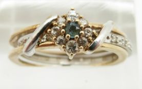 A 9ct gold ring set with an emerald and cubic zironia, 3.5g size P