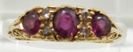 An 18ct gold ring set with rubies and diamonds, 3.8g, size M