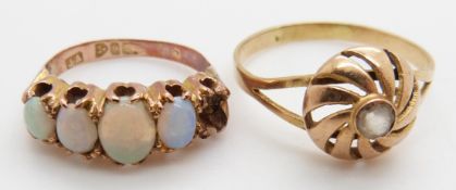 A 9ct gold ring set with opals, 3.5g, size K and a yellow metal ring 2.4g, size U