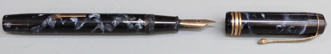 Conway Stewart No.55 fountain pen with blue marbled barrel and cap and 14ct gold nib, 13cm long.