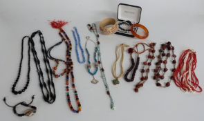 A collection of beaded necklaces including French jet, garnet, agate, pearl, etc