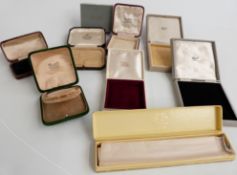 A collection of boxes including a Charles L. Reis & Co, Dublin bangle box, Beards Cheltenham,