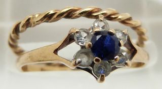 A 9ct gold ring and a 9ct gold twist ring, 1.9g, both size L