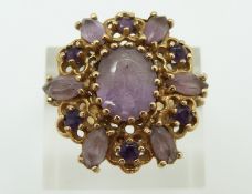 A 9ct gold ring set with amethysts, 7g, Size N