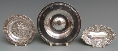 Two feature hallmarked silver pin dishes, diameter of larger 11.5cm, weight 130g and an embossed