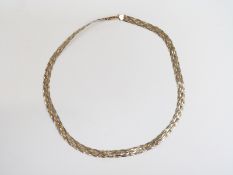 A 9ct gold bi-coloured plaited necklace, 9.8g