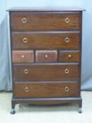 Stag or similar chest of drawers, H154 x W42 x D87cm