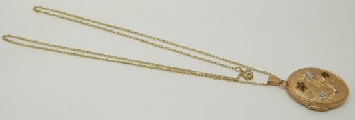 A 9ct gold locket and chain, 3.9g