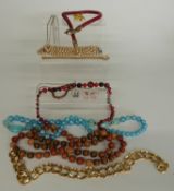 A collection of costume jewellery including silver necklace, beads, snake necklace, etc