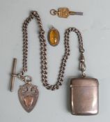 Edward VII hallmarked silver vesta, Chester 1907, on graduated link Albert chain together with an