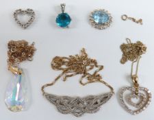 A 9ct gold necklace set with cubic zirconia in a heart design, 9ct gold necklace set with diamonds