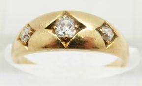 Victorian 18ct gold ring set with three diamonds in square setting, the centre diamond approximately