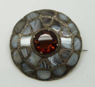 Scottish silver brooch/kilt pin set with lace agate and a central paste stone, 5cm diam