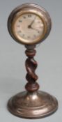 Hallmarked silver mounted desk clock with barley twist support, Chester 1930 maker Charles Perry &