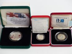 Three silver proof piedfort coins comprising crown, one pound and fifty pence, cased with