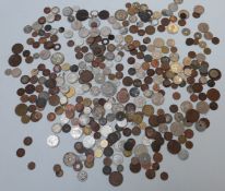 A collection of largely overseas coinage, small silver content, in a Queen Victoria commemorative