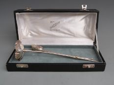 Indian white metal pair of flowers, length 25cm, weight 164g in Cooke & Kelvey, Calcutta and Delhi