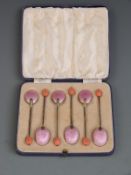 Cased set of six Art Deco pink enamel backed hallmarked silver spoons, Birmingham 1937 maker