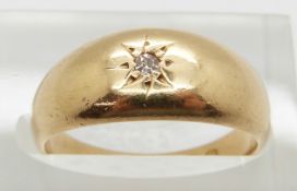 An 18ct gold ring set with a diamond in a star setting, Chester 1917, 6.3g, size N
