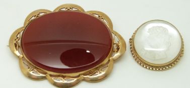 A 9ct gold brooch set with an agate plaque and a 9ct gold brooch set with a reverse glass cameo with