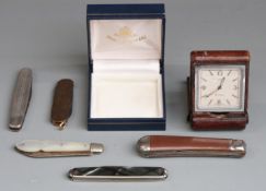 Five various penknives including one marked Victorinox and another with silver blade and mother of