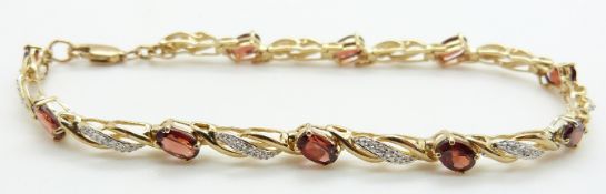 A 9ct gold bracelet set with oval cut garnets and diamonds, 8.1g