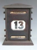 Vintage wooden perpetual desk calendar with manual winding mechanism, height 27cm