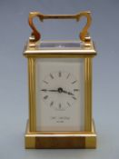 Late 20thC English brass carriage clock with W M Widdop to Roman enamel dial,  Breguet style hands