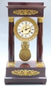 French striking 'Four Pillar' mantel clock circa mid 19thC with mahogany case with gilt decorations,