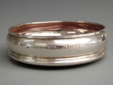 Modern feature hallmarked silver wine coaster, London 2007 maker M C Hersey & Son Ltd, diameter 13.