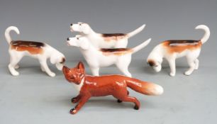 Beswick set of four first version hounds and a fox