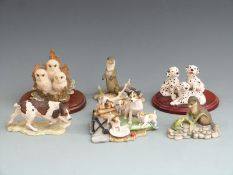 A collection of Border Fine Arts animal and bird figures, some signed Ayres, and terriers by Mairi