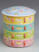 A 20thC Chinese enamelled and segmented food container, H22cm