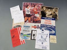 A collection of signed football memoribilia including Alan Hansen, Tom Ritchie, Tommy Ord and Tom