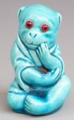 Burmantofts pottery glazed monkey with glass eyes, model no 1996, height 6.5cm