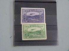 New Guinea 1935 £2 violet and £5 emerald green (SG204 and 205) and 1939 set ½d-£1 (SG212-225) on