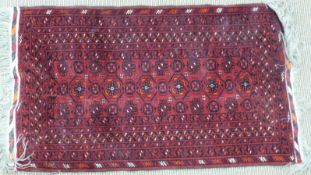 Small red and black rug, 125cm x 73cm