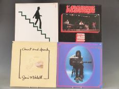 Approximately 140 albums including Steely Dan, Squeeze, Bruce Springsteen, Roxy Music, Van