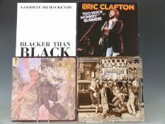 Approximately 70 albums and 12 inch singles, mostly 1970's and 80's, in hard cases