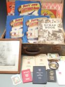 Vintage suitcase containing rugby related items from the 1950's to 1960's including scrapbooks of