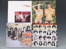 Approximately 60 albums including Roxy Music, The Rolling Stones, Sade, Michael Jackson, Duran Duran