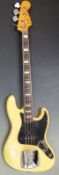 1976 Fender Jazz electric bass guitar, made in the USA, serial no. 7631431, finished in ivory