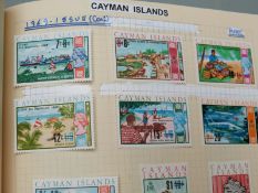 Seven albums of West Indies stamps