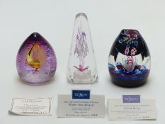 Three Caithness limited edition glass paperweights, Winter Wonderland, Mirror Image and the other,
