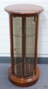Circular glazed display cabinet with two adjustable shelves, H88cm