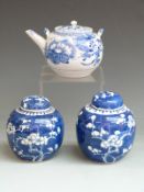 Two Chinese ginger jars decorated with blossom and a Japanese teapot, 16cm