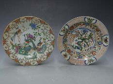 Two late 19th/early 20thC chargers/ plates, one famille rose and the other ironstone colours, 29cm