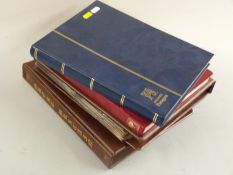 A collection of Jersey and Guernsey stamps and cover in four albums and stockbooks