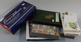 A collection of GB stamps to include first day covers, presentation packs, stockbooks individual